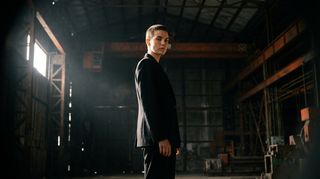 A person in a tailored suit